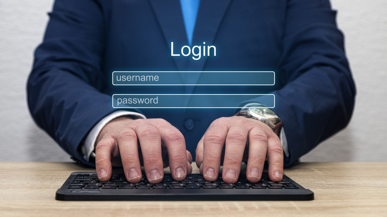 Person typing on keyboard with login page superimposed digitally