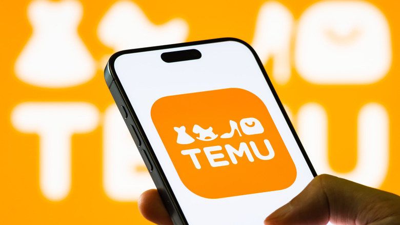 Temu logo on a smartphone
