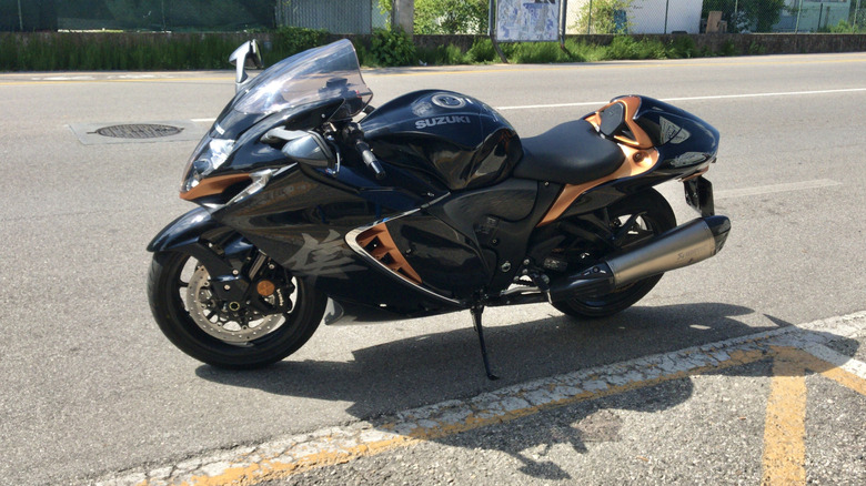 Black Suzuki Hayabusa GSX-1300R parked on a street
