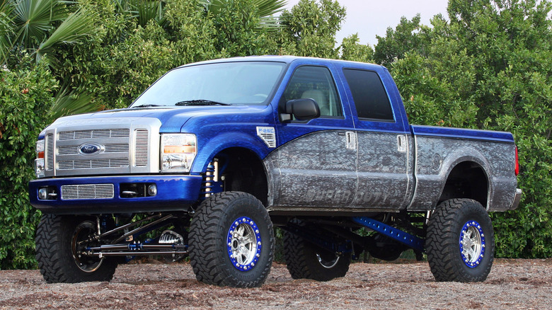 Modified and lifted 2006 Ford F-250 Super Duty, front-left 3/4 view