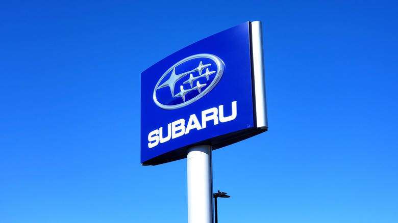 Subaru dealership logo, clear sky