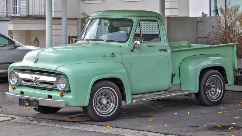 green 1953 Ford F-100 pickup truck