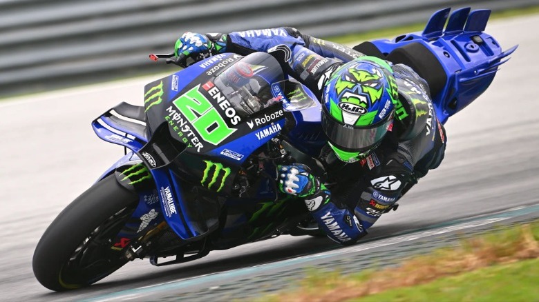 Person riding Yamaha motorcycle on track