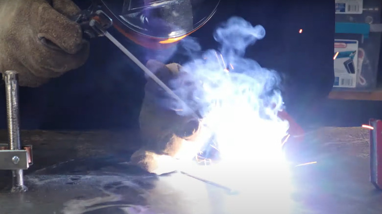 The Harbor Freight 80 AMP inverter and the stick welder in action