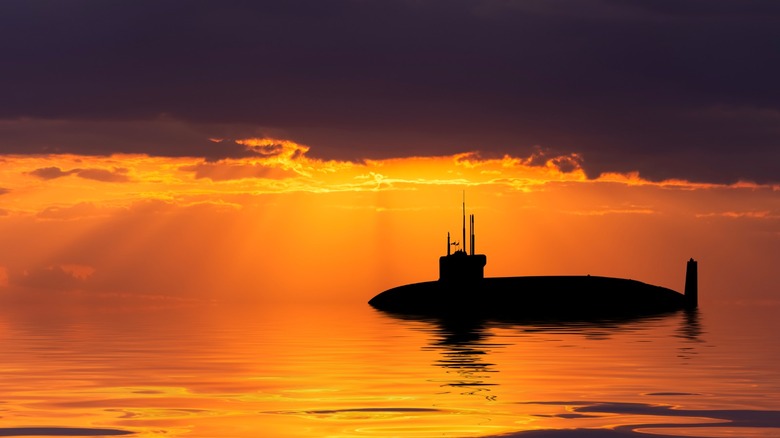 A submarine sailing into the sunset