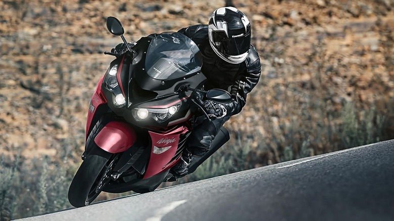 Motorcyclist negotiating a curve on the Kawasaki ZX-14R