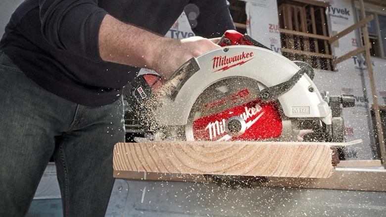 Milwaukee M18 7-1/4-inch Circular Saw cutting through wood