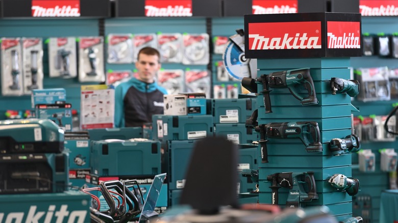 Person shopping at Makita in front of lots of tools