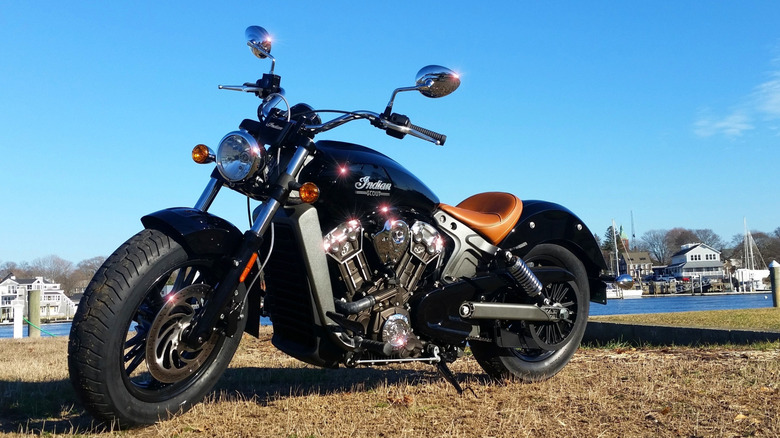 2015 Indian Scout motorcycle parked near lake
