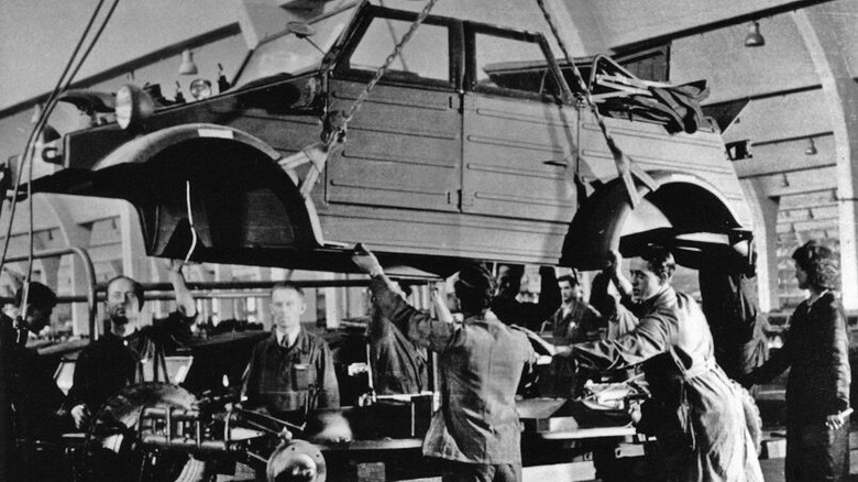 Workers building Kubelwagen in WWII-era factory