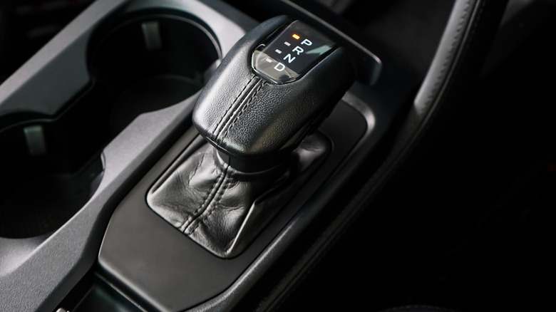 Closeup a manual shift of modern car gear shifter
