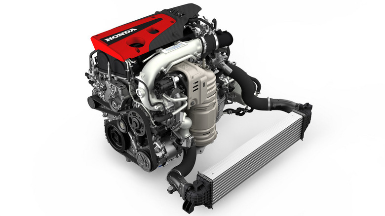 Honda Civic Type R engine on a white background