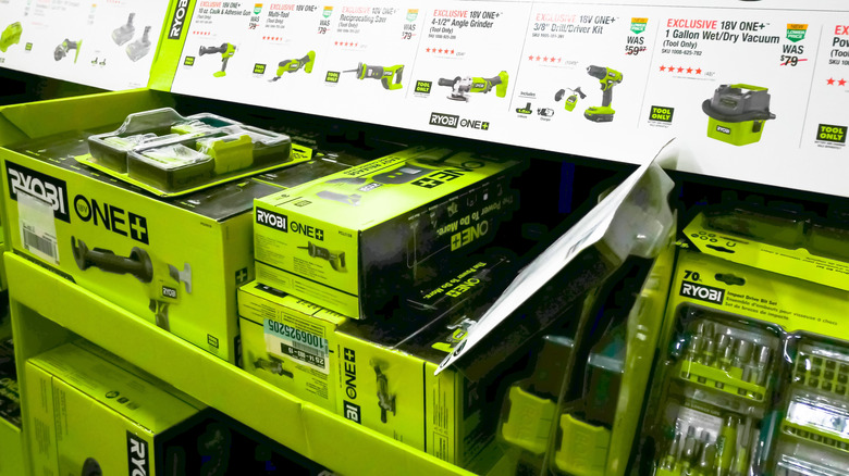 Ryobi products including socket sets and power tools in a shop display