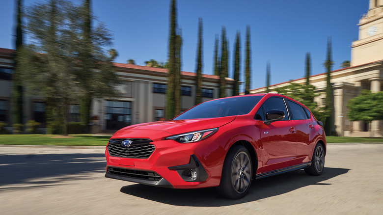 Front-quarter shot of a red 2026 Subaru Impreza