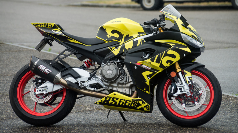 Profile view of Aprilia RS 660 motorbike parked in the street