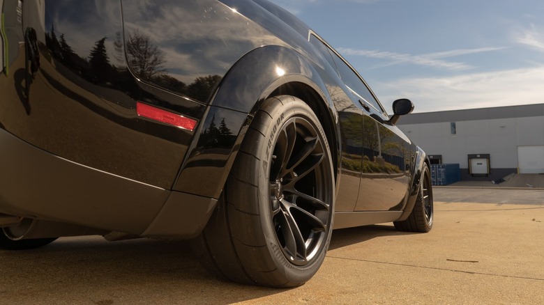 A close-up of the Atturo AZ850DR tire on a Dodge Challenger Hellcat Widebody