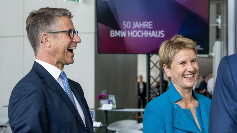 BMW heirs Stefan Quandt and Suzanne Klatten laughing