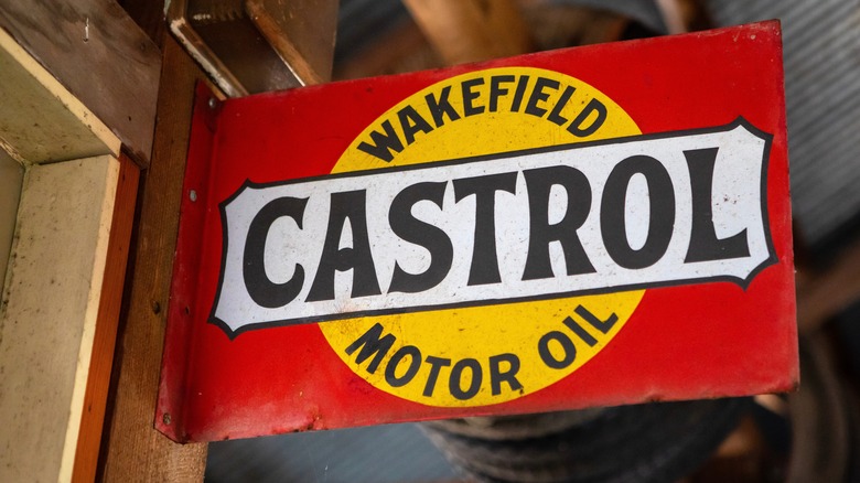 A vintage Castrol motor oil sign on display outside an establishment