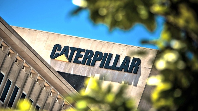 Picure displaying Caterpillar logo on side of building