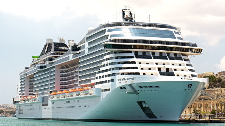The MSC Grandiosa docked at a port in Malta