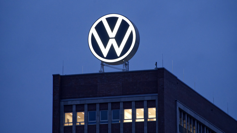 Volkswagen headquarters sign at night
