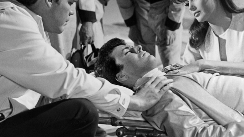 Mickey Thompson injured while racing his car in Death Valley in a scene from 1964's "The Lively Set." Thompson played himself in the film that starred James Darren and Pamela Tiffin.