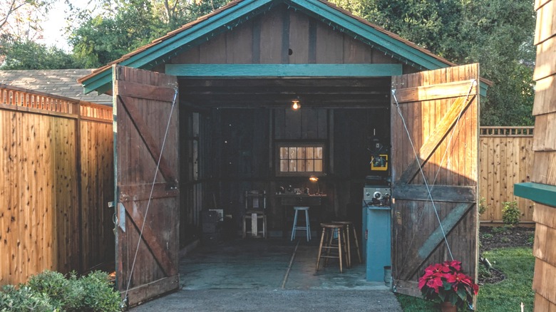 The garage in Palo Alto where Hewlett-Packard first started. The doors are open and workshop equipment is visible.
