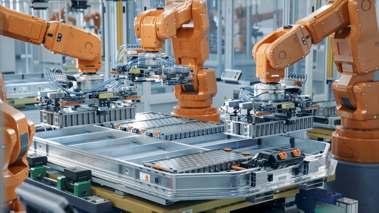 batteries being inserted into EVs
