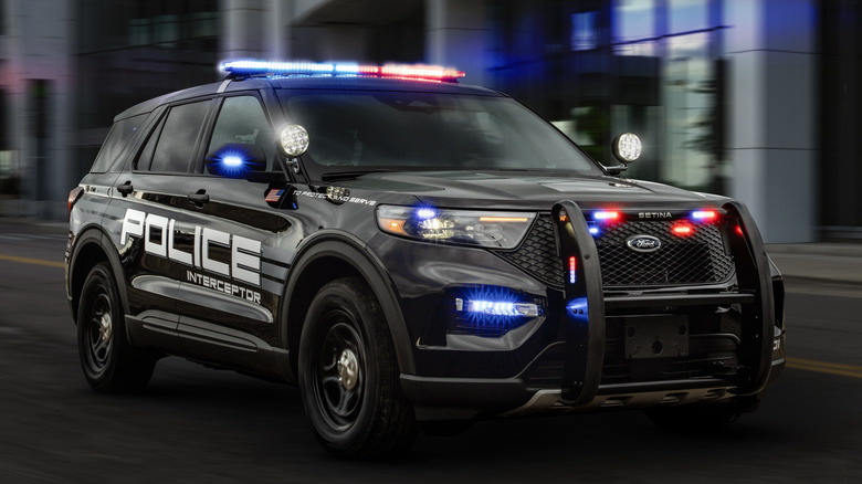 Front 3/4 view of Ford Police Interceptor Utility in city setting