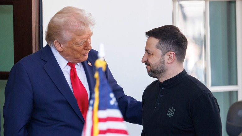 President Trump and Ukrainian President Volodymyr Zelensky greet each other during a meeting in February 2025.