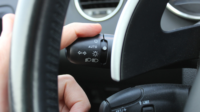 A closeup of a car's turn signal switch