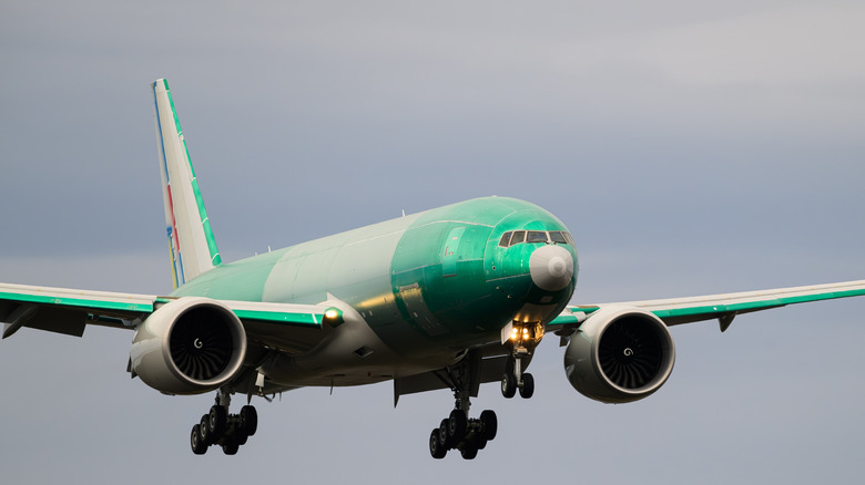 A freighter plane before paint is applied to it.