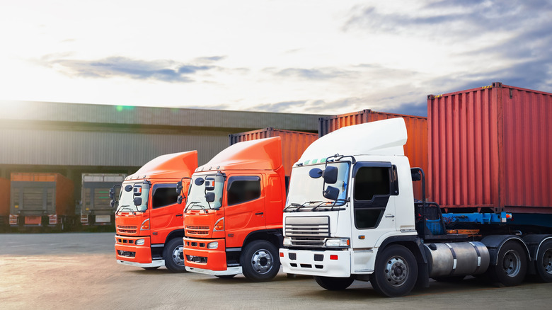 A trio of trucks parked