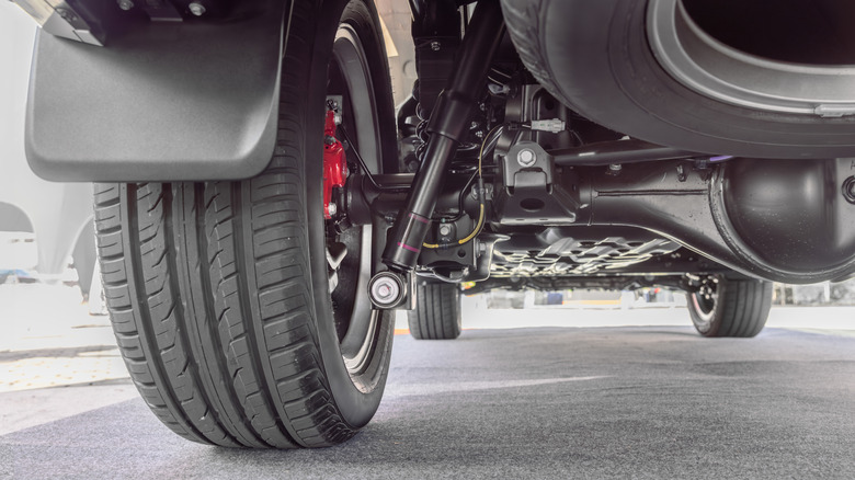 SUV suspension and rear axle under vehicle view