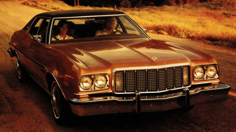 Front end of 1976 Ford Torino driving on road