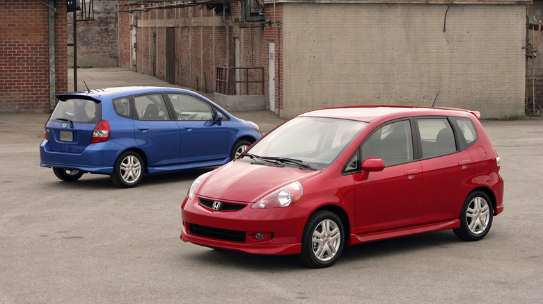 2007 Honda Fit Sport in red and blue.