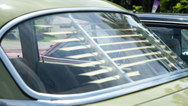 Interior window blinds on a classic Mercedes-Benz sedan