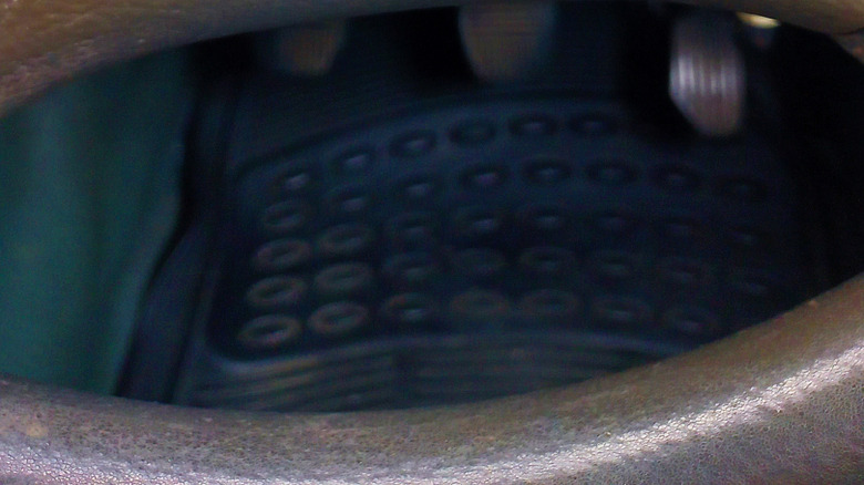 gold toyota badge on steering wheel