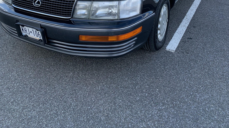 a black 1990 lexus ls400 in the present day