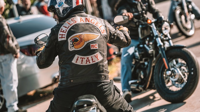 hells angels rider on classic cruiser