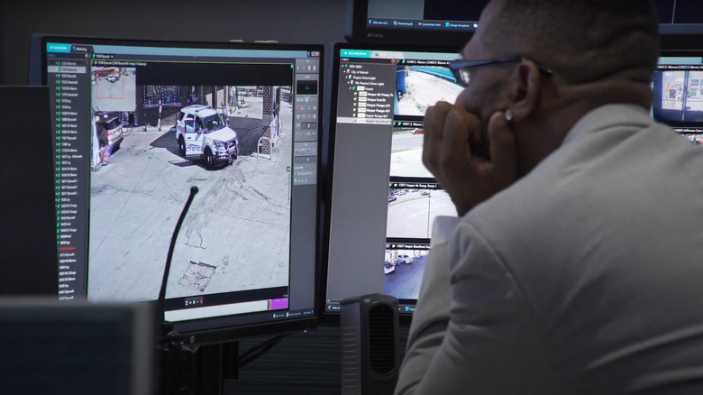Crime analyst monitoring video feed from Project Green Light business