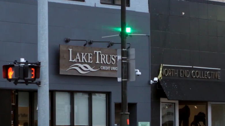 Flashing green light on pole with surveillance cameras in Detroit