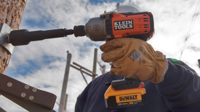 Klein power tool with DeWalt battery on power line