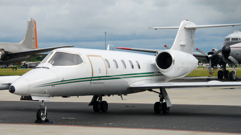 Private jet parked at an airport
