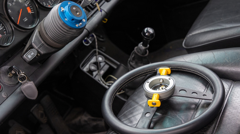 Steering wheel waiting to be installed to sports car