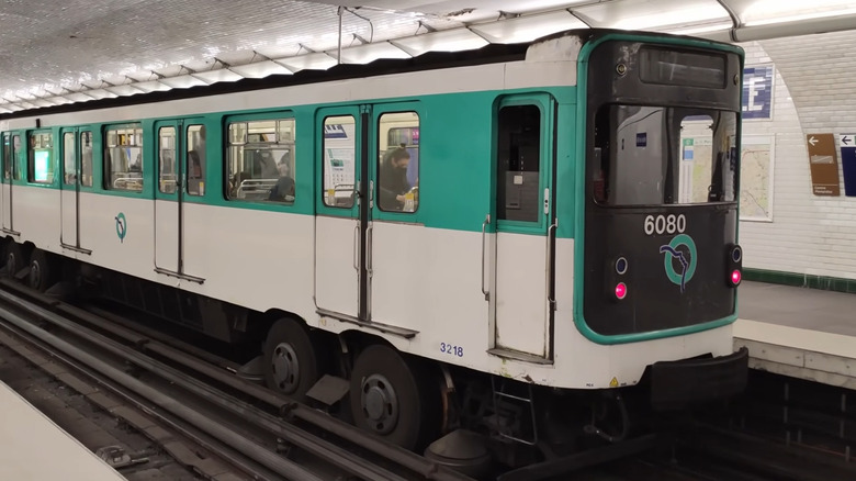 Green and white rubber tyre metro in Paris