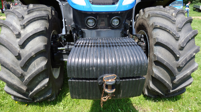 Blue tractor with front ballast box