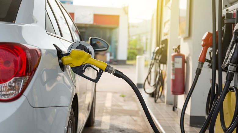 Car fueling up at gas pump