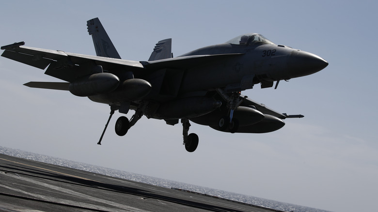 F-18 Hornet landing on an aircraft carrier