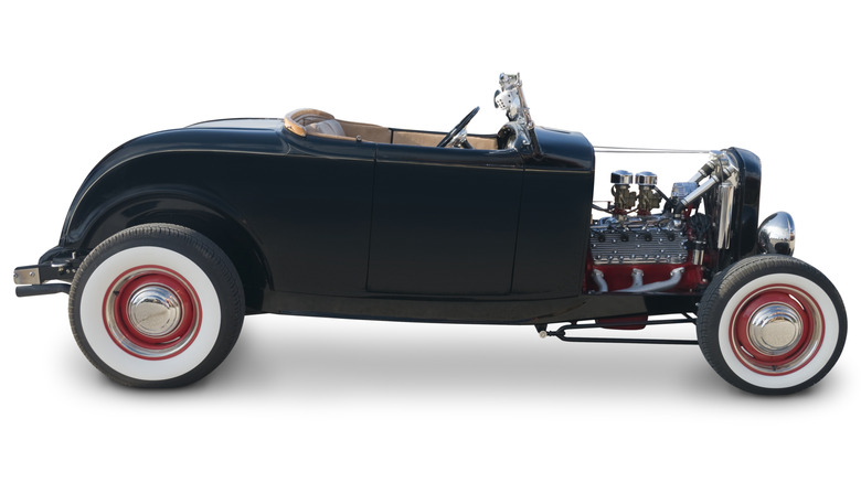 Black 1932 Ford Roadster on white background